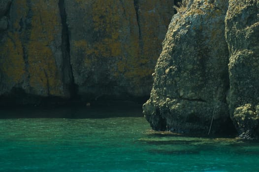Mountain and sea. rocky cliff background