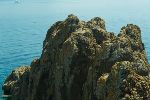 Mountain and sea. rocky cliff background