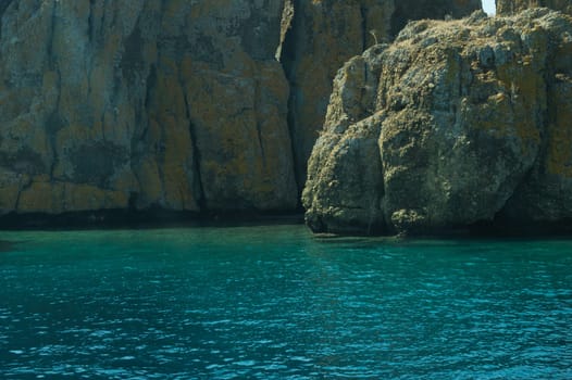 Mountain and sea. rocky cliff background