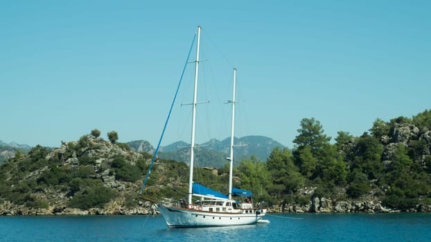 Recreation on the boat near the shore of a mountain