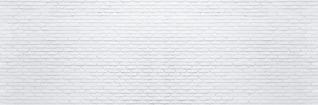 Abstract white brick wall texture background. Horizontal panoramic view of masonry brick wall for interior design.
