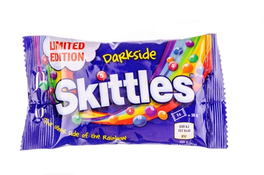 Skittles fruit-flavoured candies isolated on white background. Nowadays Skittles produced and marketed by the Wrigley Company Wrigley Company a division of Mars Incorporated, USA.