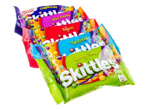 Skittles fruit-flavoured candies isolated on white background. Nowadays Skittles produced and marketed by the Wrigley Company Wrigley Company a division of Mars Incorporated, USA.