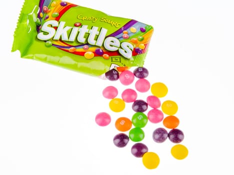 Skittles fruit-flavoured candies isolated on white background. Nowadays Skittles produced and marketed by the Wrigley Company Wrigley Company a division of Mars Incorporated, USA.