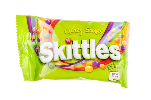 Skittles fruit-flavoured candies isolated on white background. Nowadays Skittles produced and marketed by the Wrigley Company Wrigley Company a division of Mars Incorporated, USA.