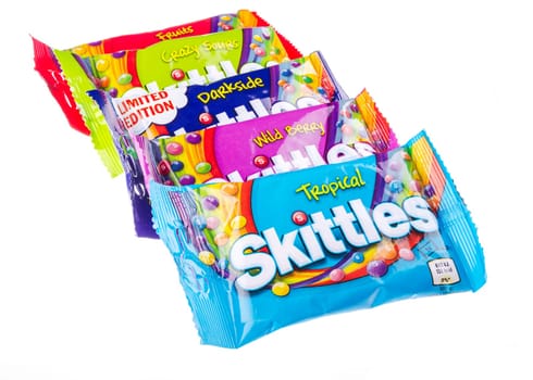 Skittles fruit-flavoured candies isolated on white background. Nowadays Skittles produced and marketed by the Wrigley Company Wrigley Company a division of Mars Incorporated, USA.