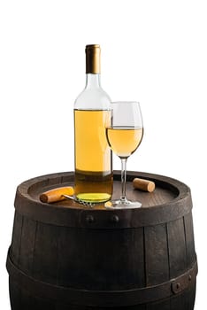 Glass and bottle of white wine on wooden barrel background isolated on white