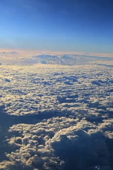 Window seat, a flight in the sunset