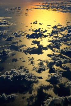 Window seat, a flight in the sunset