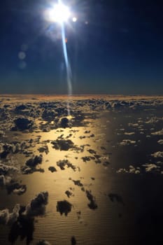 Window seat, a flight in the sunset