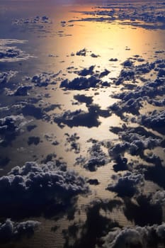 Window seat, a flight in the sunset