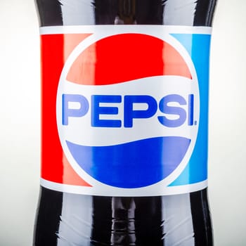 Pepsi drink isolated on gradient background. Pepsi is carbonated soft drink produced by PepsiCo. Pepsi was created and developed in 1893.