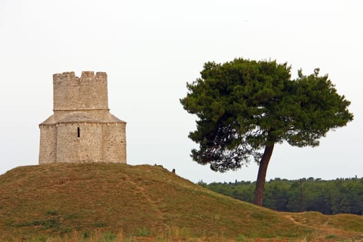 Church of St. Nicholas is a Pre-Romanesque style Roman Catholic church built in form of a fortress from the beginning of the 12th century, Nin, Croatia