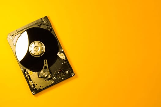 Colorful hdd. open hard disk drive. The concept of data storage. data array. hard drive from the computer. hdd with mirror effect. copy space