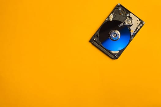 Colorful hdd. open hard disk drive. The concept of data storage. data array. hard drive from the computer. hdd with mirror effect. copy space