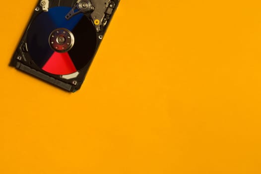 Colorful hdd. open hard disk drive. The concept of data storage. data array. hard drive from the computer. hdd with mirror effect. copy space