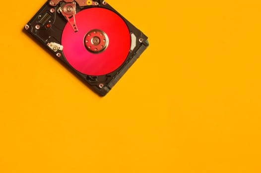 Colorful hdd. open hard disk drive. The concept of data storage. data array. hard drive from the computer. hdd with mirror effect. copy space