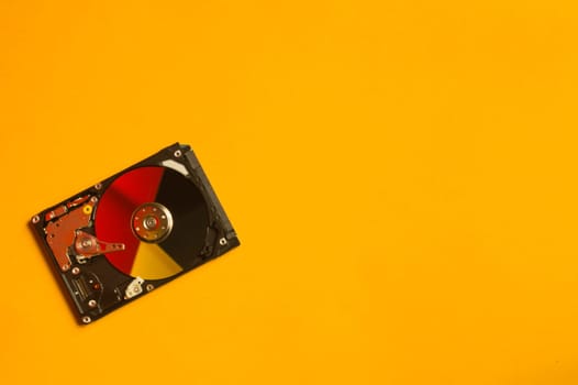 Colorful hdd. open hard disk drive. The concept of data storage. data array. hard drive from the computer. hdd with mirror effect. copy space