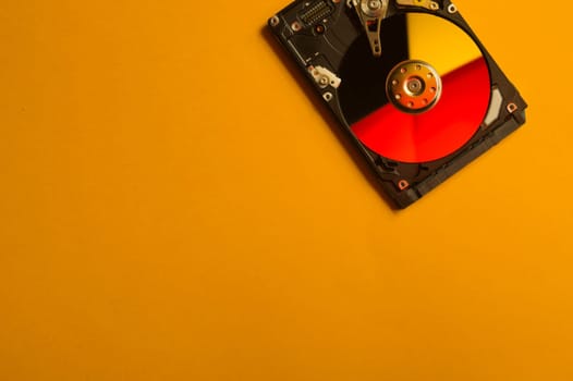 Colorful hdd. open hard disk drive. The concept of data storage. data array. hard drive from the computer. hdd with mirror effect. copy space