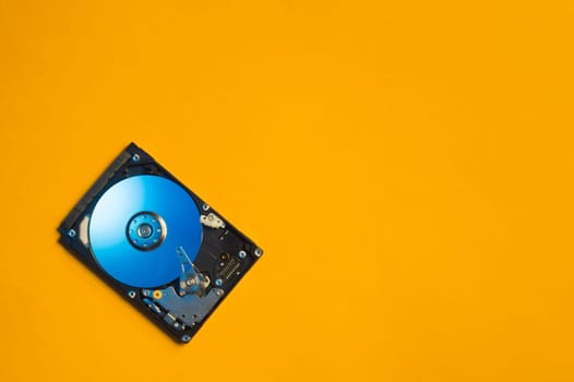 Colorful hdd. open hard disk drive. The concept of data storage. data array. hard drive from the computer. hdd with mirror effect. copy space