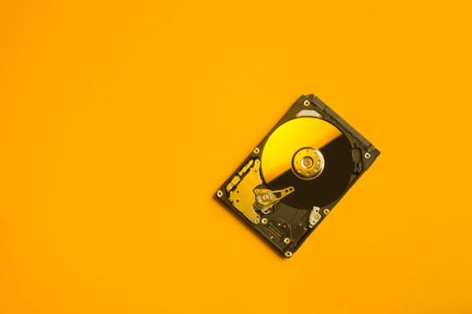 Colorful hdd. open hard disk drive. The concept of data storage. data array. hard drive from the computer. hdd with mirror effect. copy space