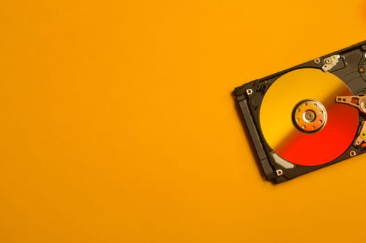Colorful hdd. open hard disk drive. The concept of data storage. data array. hard drive from the computer. hdd with mirror effect. copy space