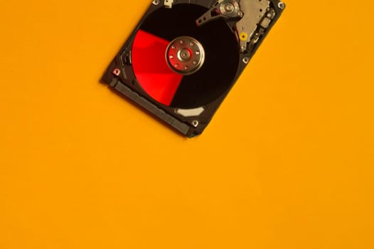 Colorful hdd. open hard disk drive. The concept of data storage. data array. hard drive from the computer. hdd with mirror effect. copy space