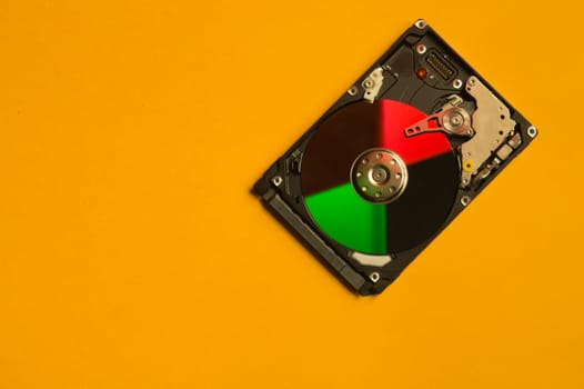 Colorful hdd. open hard disk drive. The concept of data storage. data array. hard drive from the computer. hdd with mirror effect. copy space