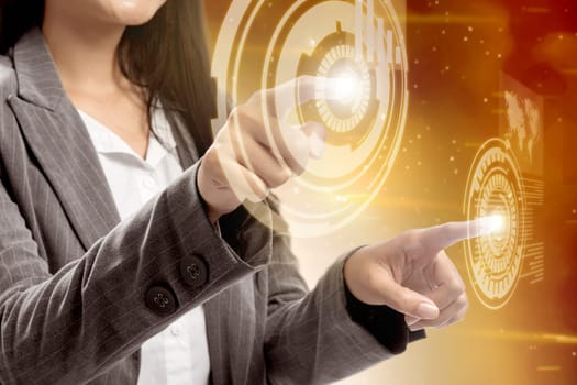 Business woman touch a circle on virtual screen which display the interface of world map and binary code. Digital technology concept