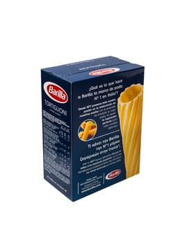 CHISINAU, MOLDOVA - July 15, 2018: Barilla Tortiglioni Italian pasta in a box isolated on white background. Barilla is an Italian food company, founded in 1877 in Parma, Italy. The back of the packaging