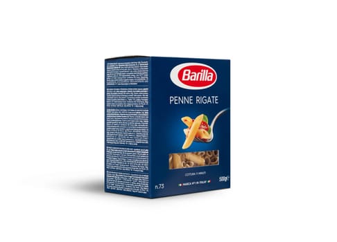 CHISINAU, MOLDOVA - April 20, 2018: Barilla Penne Rigate Italian pasta in a box isolated on white background. Barilla is an Italian food company, founded in 1877 in Parma, Italy.
