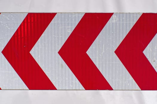 Chevron warning traffic sign red arrows