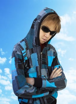 Teenager in black glasses on isolated background
