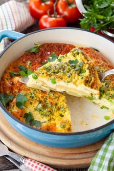 Delicious baked fritatta with peas, potatoes and fresh parsley