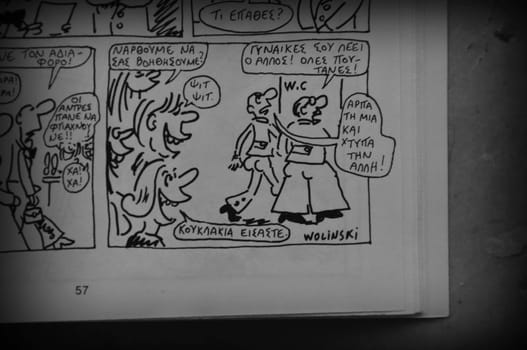 ATHENS, GREECE - JANUARY 7, 2015: Comics by cartoonist Georges Wolinski (1934 - 2015) one of the victims of the shooting at Charlie Hebdo satirical newspaper on January 7, 2015 in Paris, France.