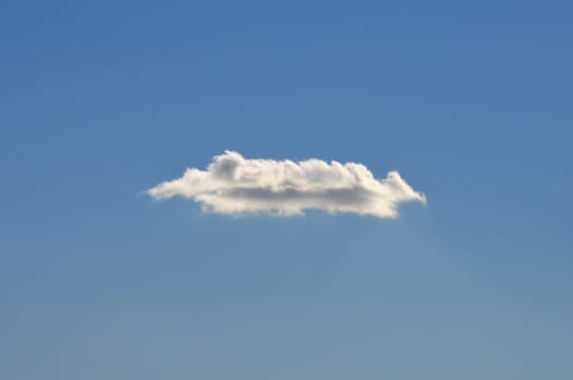 Clear blue sky and white cloud on a sunny day. Nice weather.