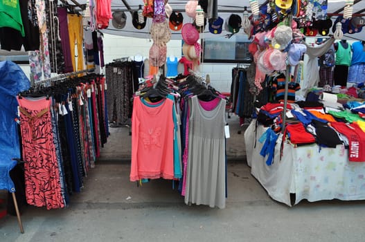ATHENS, GREECE - AUGUST 15, 2014: Casual summer clothes and accessories for sale at street market.