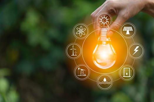 Hand of male holding a light bulb and copy space. Ideas and creative concept.