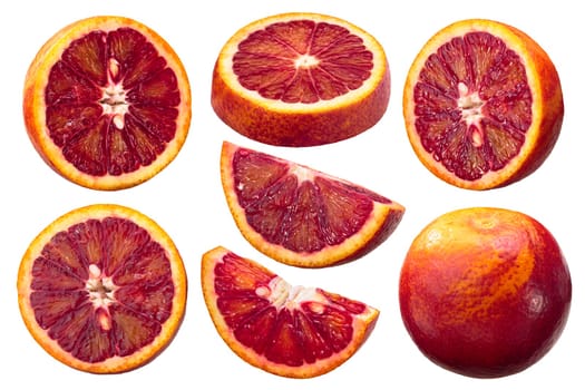 Blood oranges (Citrus x sinensis fruits), whole, halved and slices