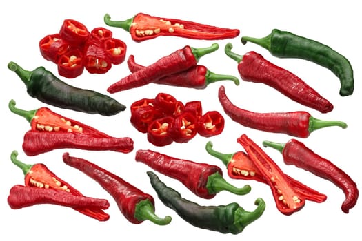 Kashmiri Mirch Peppers (Capsicum annuum fruits), ripe, unripe, whole and sliced, halved pods