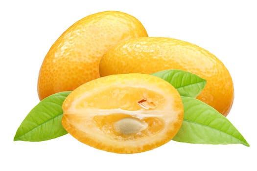 Kumquats (Citrus japonica fruits) group of three with leaves