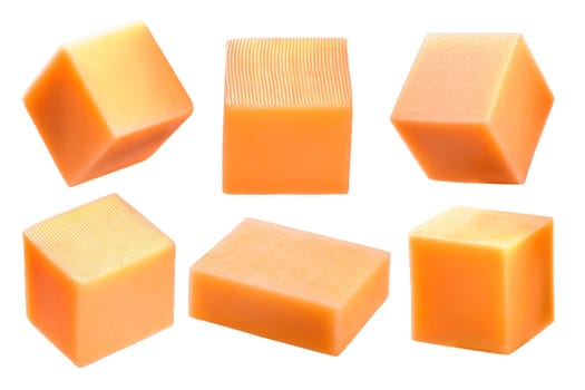 Cheddar cheese cubes, rectangular blocks or pieces isolated on white, shadowless, with annato