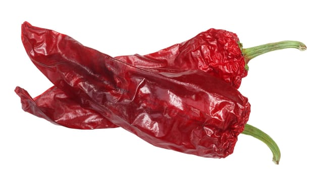 Dried Aleppo pepper, whole pods crossed, top view