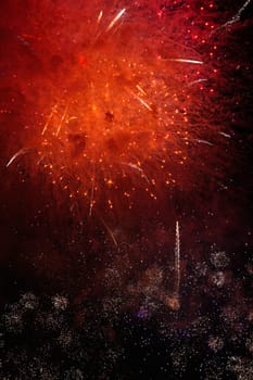 Red fireworks dark background