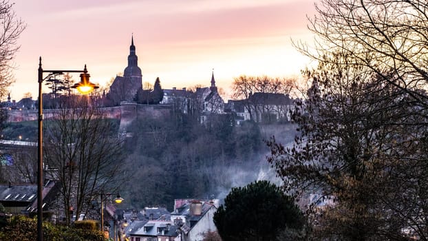 Twilight view of the city of Dinan and its ramparts, Brittany, France