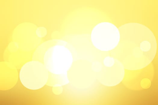 A festive abstract golden yellow gradient background texture with glitter defocused sparkle bokeh circles. Card concept for Happy New Year, party invitation, valentine or other holidays.