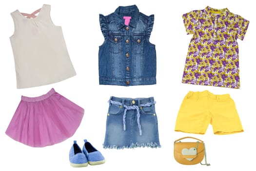 Collage set of little girl summer clothes isolated on a white background. The collection of jeans skirt, a sleeveless jeans vest, shoes, short summer skirt, shirts and a bag. Little girl fashion.