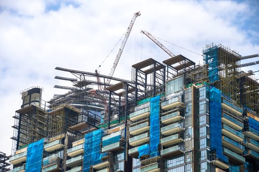 Construction site of business skyscraper in Singapore