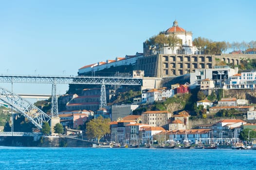View of old downtown, city Castle and famous Dom Luiz Bridge, Porto, Portugal