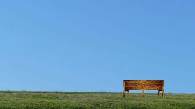 The Summer landscape with green grass, mountain and clouds